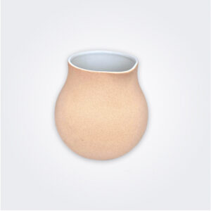 Beige ceramic vessel product picture.