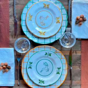 Bontempo Christmas collection plates on a rustic table setting.
